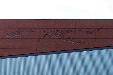 Rockpanel - kunstværk udskåret i facaden